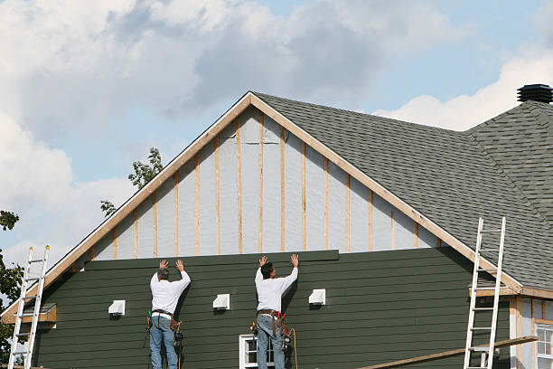 Professional Siding technician working in Salem, IN